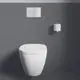 Weißer Toilettenreservoir mit flacher Sitzfläche vor grauer Wand. Neben dem WC ein runder, weißer Toilettenpapierhalter. Ideal Standard Produkte erkennbar.